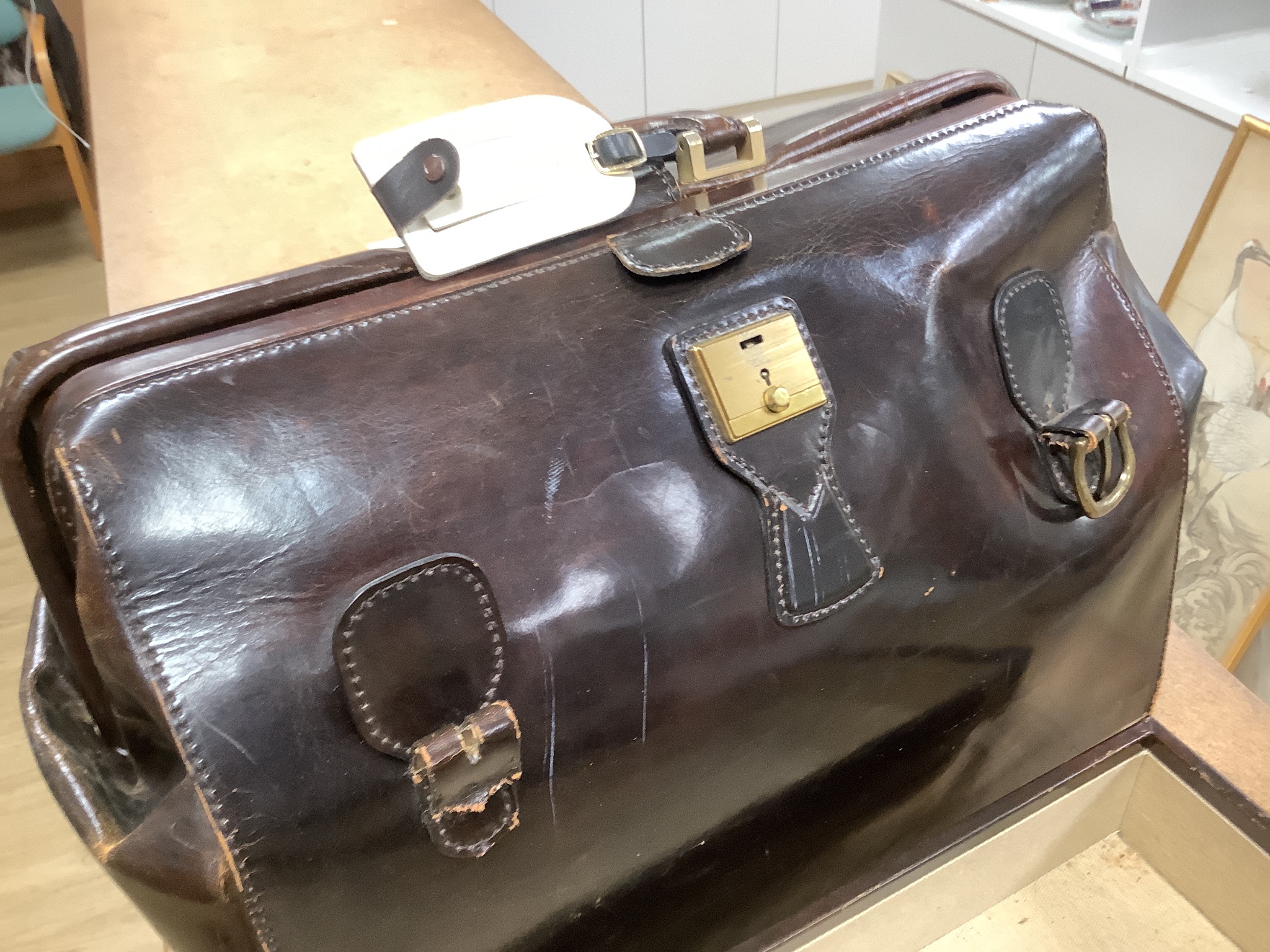 An Italian leather holdall, the base incorporating two detachable cases, with attached Concorde ‘’Frequent flyer’’ tag, 50cm high